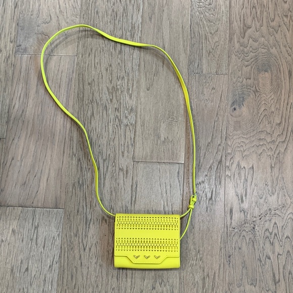 Stella & Dot Handbags - NWOT Stella & Dot Neon Yellow Perforated Crossbody Bag